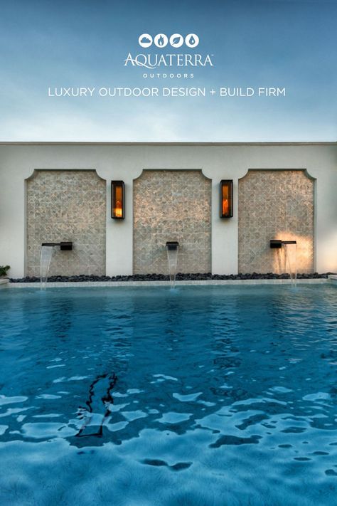 This elegant water feature wall takes this pool space to a whole new level of luxury! With three striking scuppers and sleek white tile, it’s a design you’ll be drawing inspiration from for years to come. Water Feature Wall, Pool Water Features, Pool Water, White Tiles, Water Feature, Inception, Outdoor Design, Feature Wall, Water Features