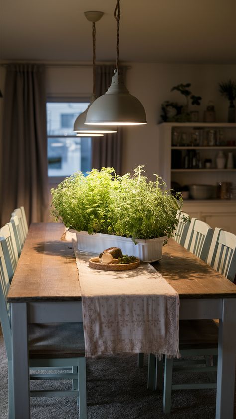 Elevate your dining experience with a stunning herb garden centerpiece on a rustic INGATORP table! Paired with stylish INGOLF chairs and a delicate SOMMARLIV table runner, this setup is perfect for both casual meals and entertaining guests. The statement ÄPPLARÖ bench adds a unique touch, while warm pendant lighting creates an inviting atmosphere. Ready to transform your dining space? Discover tips and tricks to recreate this cozy look in your home! #DiningRoomInspo #HerbGarden #IKEAStyle Hanging Branch Over Dining Table, Cozy Dining Area, Garden Centerpiece, Dining Space, Entertaining Guests, Herb Garden, Dining Experience, Dining Experiences, Dining Area