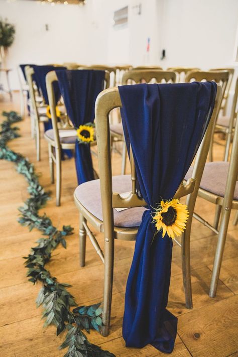 Sunflower Chair Decor Wedding, Navy Blue And Sunflower Wedding Theme, Royal Blue Sunflower Wedding, Sunflower Wedding Aisle, Sunflower Wedding Ceremony, Sunflower And Blue Wedding, Chair Decoration Ideas, Blue Sunflower Wedding, Wedding Sunflowers