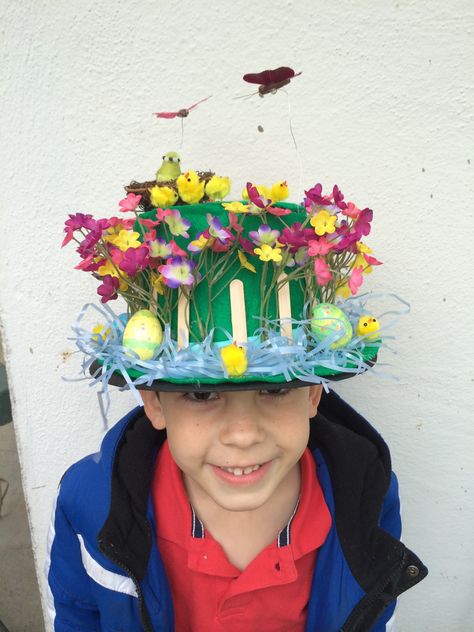 Easter Bonnet 2014, all items purchased at Michaels. Top hat wrapped with green felt, all items added with glue gun. Birds nest, little chicks, small sized eggs and flying butterflies. Flying Butterflies, Easter Bonnet, Birds Nest, Bird Nest, Glue Gun, Top Hat, Coco Chanel, Butterflies, Glue