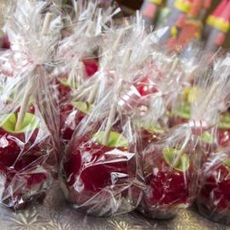 Let the candy fully cool to room temperature before wrapping the apples. Chinese Christmas, State Fair Of Texas, Candy Apple Recipe, Halloween Food Appetizers, Winter Wedding Favors, Remove Wax, Toffee Apple, Wedding Favors Fall, Candied Fruit