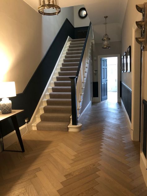 Dark Oak Panelling, Herringbone Wood Floor Hallway, Herringbone Hallway Floor, Hallway Herringbone Floor, Parquet Hallway, Neutral Staircase, Herringbone Floor Hallway, Stair Styles, Herringbone Hallway