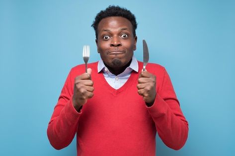 Photo hungry african man holding fork an... | Premium Photo #Freepik #photo #man-eating #people-eating #eating-food #person-eating Fork And Knife, Cartoon Man, Very Hungry, Cartoon Drawing, African Men, Man Photo, Premium Photo, Hold On, Stock Photos