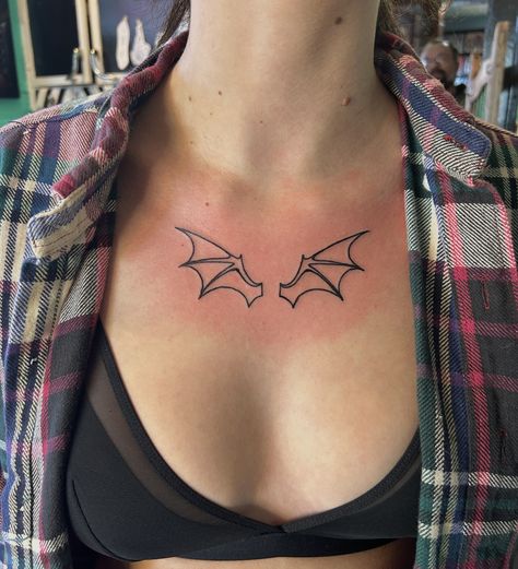 Simple Bat Wings Tattoo, Bat Wing Tattoo Knee, Bat Tattoo On Shoulder, Aesthetic Bat Tattoo, Underbust Bat Tattoo, Bat Wings Chest Tattoo, Bat Wing Chest Tattoo, Small Bat Wings Tattoo, Bat Wings Tattoo Knee