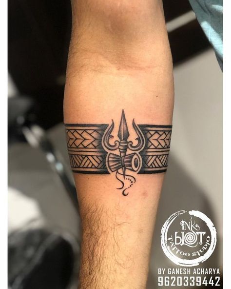 Ring Tattoo For Men Arm, Hand Ring Tattoo For Men, Arm Bending Tattoo, Tatoos Men Hand Band, Shiva Tattoo Design For Men Arm, Wrist Band Tattoo Men, Shiv Band Tattoo, Trishul Armband Tattoo, Shiva Armband Tattoo Design