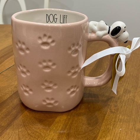 Nwt. Rae Dunn, Pink, “Dog Life”, Ceramic Mug. Beautiful Soft Pink Mug Embossed With Tiny Paw Prints. Snoopy Himself Lays On Top Of Handle! Cream Color Interior With “Dog Life” Printed On One Side. Perfect For Any Dog/Animal/Snoopy Lover! Dishwasher Safe. Sorry - This One Is Not Recommended For The Microwave. New, With Tag. Stored In Smoke-Free Home. Please Note*. All Rae Dunn Items Are Known To Be “Perfectly Imperfect”. Any Blemishes/Imperfections Are Unique To Each Piece. Dog Pottery Ideas, Cute Clay Cups, Dog Mugs Ceramic, Animal Mugs Ceramic, Mug Handles, Tiny Paw Print, Mugs For Mom, Dog Pottery, Snoopy Mug