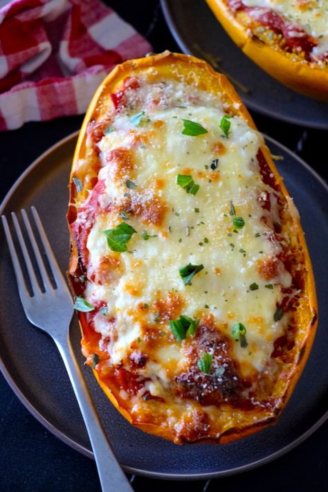 Spaghetti Squash Lasagna Boats | Dashing Dish Roasted Garlic Spaghetti Squash Lasagna Boats, Spaghetti Squash Lasagna Boats, Lasagna Boats, Oven Bakes, Spaghetti Squash Boats, Spaghetti Squash Boat, Squash Boats, Spaghetti Squash Lasagna, Squash Lasagna