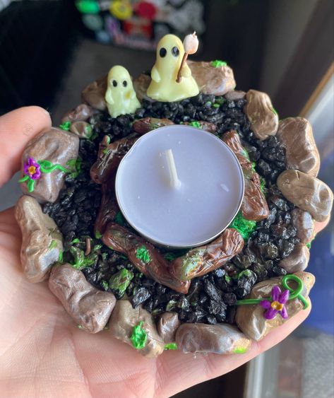 Polymer clay candle holder Polymer Clay Glass Jars, Diy Clay Crystal Holder, Diy Clay Tea Light Holder, Air Dry Clay Witchy Projects, Polymer Clay Tea Light Holder, Witchy Air Dry Clay Crafts, Clay Witchy Crafts, Clay Crystal Holder, Clay Glasses Holder