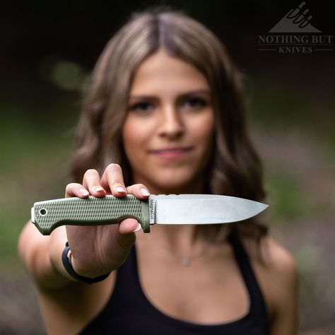 A young woman holding a survival knife in front of here. Survival Knives, Tough Woman, Finger Guard, Kydex Sheath, Bushcraft Knives, Outdoor Knife, Edc Knife, Outdoor Tools, Outdoor Store