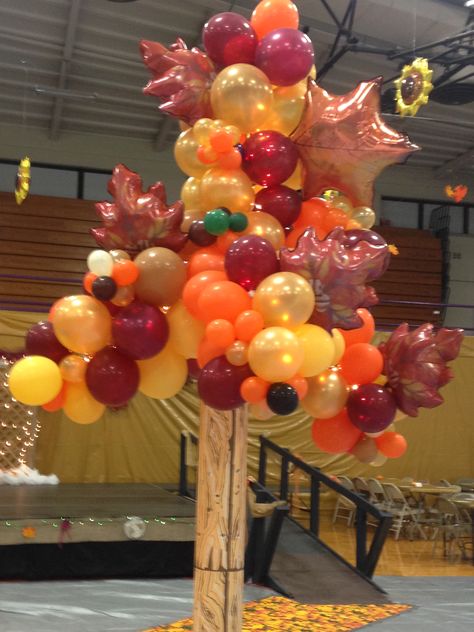 Fall balloon tree at SHS 2015 Homecoming Dance.  Theme:  The Four Seasons. Festival Balloon Arch, Fall Dance Decorations, Homecoming Dance Decorations, Thanksgiving Balloons, Balloon Arch Ideas, Harvest Dance, School Dance Themes, Homecoming 2023, Homecoming Decorations