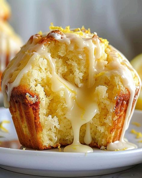 Zesty Lemon Dream Muffins 💛🍋🧁 Ingredients: 1 3/4 cups all-purpose flour 1/2 cup granulated sugar 1/2 teaspoon baking soda 1/2 teaspoon salt 1/2 cup unsalted butter, melted 2 large eggs 1/2 cup plain Greek yogurt 1/4 cup freshly squeezed lemon juice 1 tablespoon lemon zest 1 teaspoon vanilla extract 1/4 cup whole milk Directions:  Preheat the oven to 350°F (175°C). Line a muffin tin with paper liners or lightly grease with butter. In a large bowl, whisk together the flour, sugar, baking soda, and salt. In another bowl, combine the melted butter, eggs, Greek yogurt, lemon juice, lemon zest, and vanilla extract. Pour the wet ingredients into the dry ingredients and mix until just combined. Do not overmix. Gradually add the milk to the batter, stirring until smooth. Divide the batter evenly Luscious Lemon Cream Cheese Muffins, Lemon Cream Cheese Muffins Recipes, Lemon Cream Cheese Muffins, Recipes Tower, Optimal Recipes, Lemon Cream Cheese, Lemon Drops, Simple Muffin Recipe, Cream Cheese Muffins