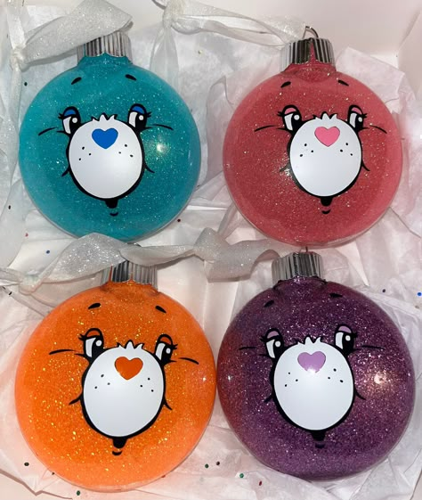 For my fellow 80s/90s kids How adorable are these custom made care bear ornaments! Ornaments come in a set of 4 with a matching gift box  Ornaments are made out of plastic, designed with permanent vinyl  and about 3 inches! No returns Care Bear Ornaments, Cute Care Bears, Care Bear Gift Ideas, Care Bear Christmas Tree, Friends Ornaments Diy, Glitter Ornaments Diy Mod Podge, Character Ornaments, Care Bear Christmas, Disney Christmas Theme