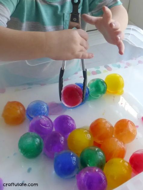 Rainbow Ice Ball Sensory Bin - icy colorful fun! Art Themed Sensory Bin, Ball Study Creative Curriculum Art, Ball Theme For Preschool, Ball Crafts For Toddlers, Ball Activity For Toddlers, Ball Study Preschool, Balls Preschool Theme, Creative Curriculum Balls Study, Balls Creative Curriculum Ideas