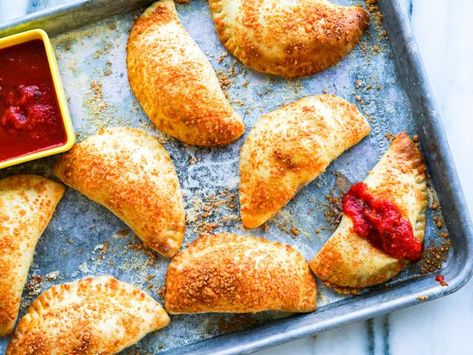 Mini Calzones Mini Calzones Recipes, Calzones Recipe, Mini Calzones, Garlic Pasta Sauce, 30 Min Meals, Garlic Pasta, Gooey Cheese, Easy Weeknight Meals, Easy To Love