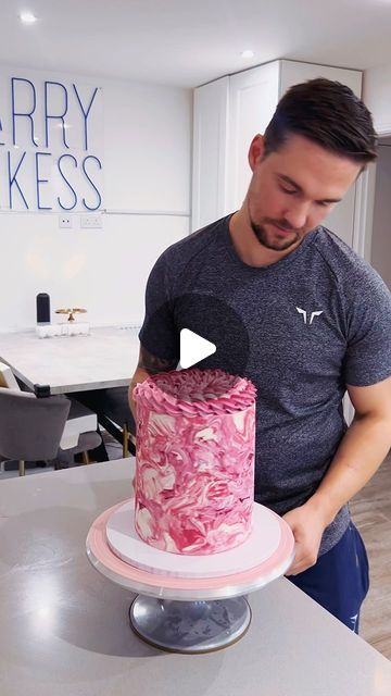 Harry Shakespeare on Instagram: "💕PINK💕  A marble effect pink buttercream cake 😍  This cake is all dairy free, something that can be a challenge with tall cakes to keep stable! This come came out good 🌱  The base of this tall 6 inch cake is vegan vanilla sponge with dairy free strawberry buttercream and homemade strawberry jam filling. Can’t wait to dive into this later!  This cake was made for my wife’s birthday today, we opt for dairy free so that our son Rio who has a  milk and eggs allergy can eat some too ❤️  Let me know what you think!  You can get my American buttercream recipe from my website HarryBakess.com I just swap out the unsalted butter block and cream for dairy free alternatives ✅  Colours @colour.mill code HARRY10 for 10% off Board @olbaa_cake_box  code HARRY10 for 10% Pink Buttercream Cake, American Buttercream Recipe, 6 Inch Cake, Food Reels, Butter Block, Pink Buttercream, American Buttercream, Vanilla Mug Cakes, Buttercream Cake Designs