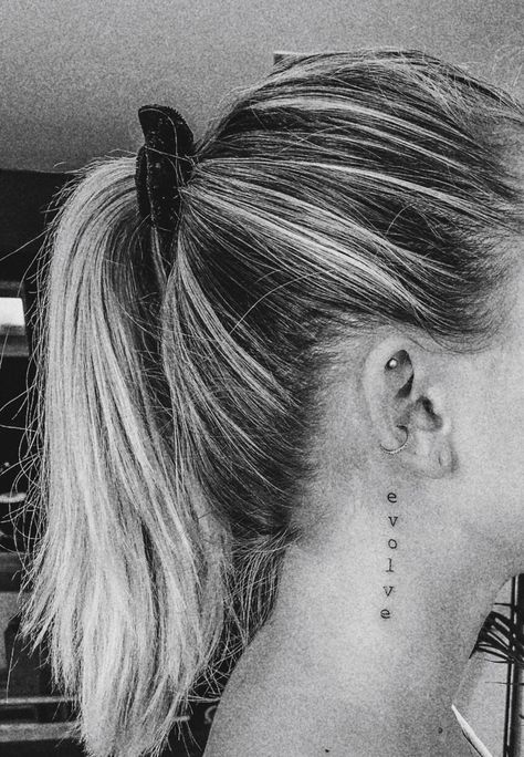 Evolve Tattoo Words, Behind The Ear Writing Tattoo, Evolve Tattoo Ideas, Neck Minimalist Tattoo, Writing Behind Ear Tattoo, Ear Tattoo Words, Behind The Ear Tattoo Ideas Words, Dainty Neck Tattoos For Women, Side Neck Tattoos Women Ideas