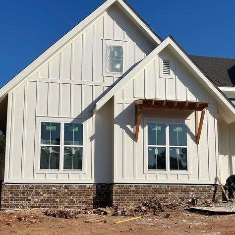 Jenny | House updates! Brick started today and we are in love with it! @cherokeebrick Old Tavern is what we chose for the exterior. Sheetrock is… | Instagram Brick Plus Siding Exterior, Colored Board And Batten Exterior, Siding And Brick House Exterior, Brick Bottom Of House Exterior, White Brick With Board And Batten, Adding Board And Batten To Exterior, Cobblestone Exterior House, Brick Options Exterior, Brick Trim Exterior