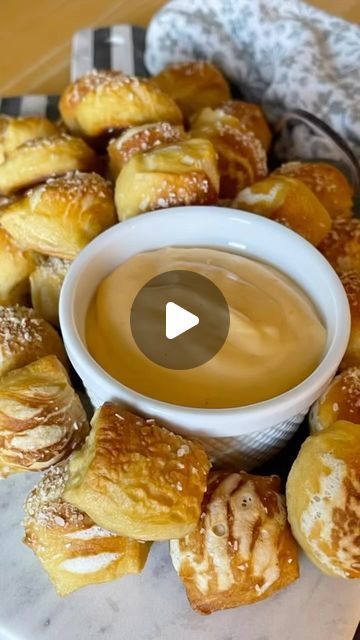 Jean Smith on Instagram: "SOFT PRETZEL BITES WITH CHEESE DIP🥨

These pretzel bites are the perfect party food! So easy to prepare and totally addictive😍

Ingredients:
1 1/2 cups warm water (lukewarm)
2 1/4 teaspoons instant or active dry yeast (1 standard packet)
1 Tablespoon brown sugar
1 teaspoon salt
1 Tablespoon salted butter, melted and slightly cool 
3 3/4 cups all-purpose flour
Coarse salt for topping
Baking Soda Bath
1/2 cup baking soda
9 cups water
Dough: Whisk together warm water, yeast, and sugar. Cover yeast mixture and allow to sit for 5 minutes or until foamy on top.
Add salt, melted butter, and 3 cups of flour. Beat on low speed for 1 minute, then add 3/4 cup of flour. Beat on low speed until the dough pulls away from the sides of the bowl, about 2 minutes. If dough is sti Dough Whisk, Soft Pretzel Bites, Jean Smith, Baking Soda Bath, Soft Pretzel, Coarse Salt, Soft Pretzels, Cheese Dip, Dry Yeast