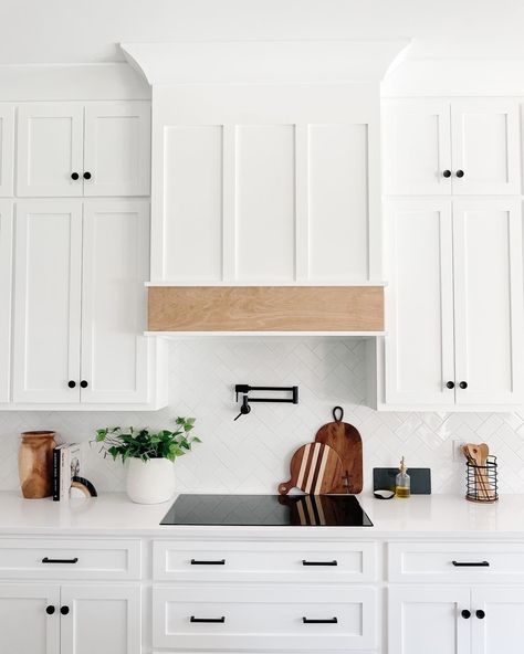 Heather Casteel | Are you team all white kitchen or do you prefer one with color? I love sooo many different styles, this choice was VERY hard for me during… | Instagram Off White Sherwin Williams, White Kitchen Shaker Cabinets, Wood Hood Vent Cover, White Kitchen Shaker, White Herringbone Tile Backsplash, Wood Hood Vent, White Sherwin Williams, White Herringbone Tile, Hood Vent Cover