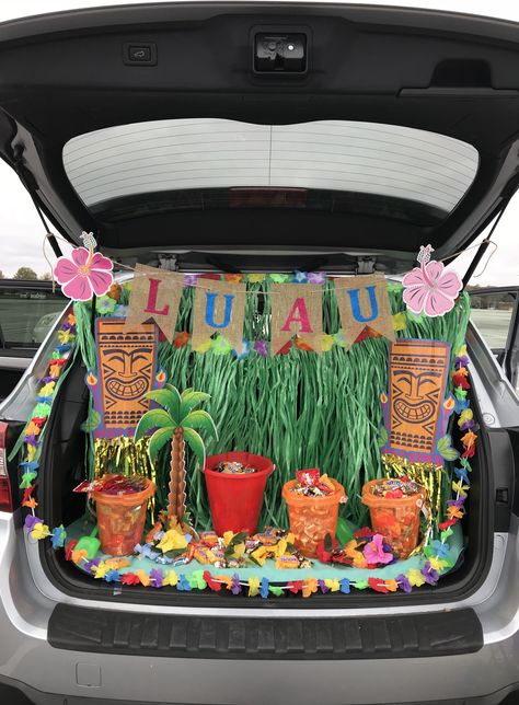 Luau themed trunk or treat using items mostly from Dollar Tree! Trunk Or Treat Luau Theme, Hawaiian Truck Or Treat, Trunk Or Treat Themes For Suv, Fiesta Trunk Or Treat Ideas, Halloween Theme Trunk Or Treat Ideas, Broadway Trunk Or Treat, Trunk Or Treat Ideas Hawaiian, Trunk Or Treat Ideas Dollar Tree, Hawaii Trunk Or Treat Ideas