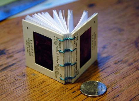 Tiny books made out of old slides. Photographic Slides Art, Old Slides Projects, Book Diy Crafts, Bookbinding Techniques, Upcycled Books, Film Negatives, Coptic Binding, Tiny Books, Photo Slides