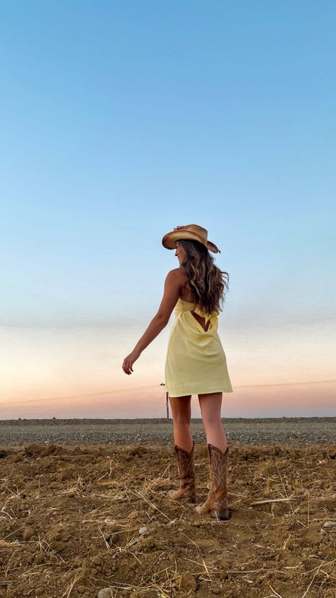 Sun Dress And Boots, Yellow Dress With Cowboy Boots, Senior Pictures Outfits Sunflower Field, Western Sundress, Western Sunflower Photoshoot, Western Spring Senior Pictures, Boots And Dress Outfit, White Dress Cowgirl Boots Senior Pictures, Senior Pics Cowboy Boots