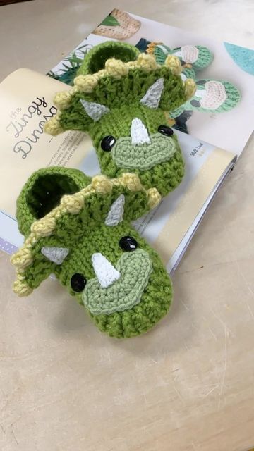 Crochet Animal Socks, Crochet Dinosaur Slippers, Dinosaur Slippers, Crochet Gift Ideas, Yarn Clothes, Dinosaur Nursery Decor, Crochet Rose Pattern, Crochet Lovey, Baby Crochet Patterns Free