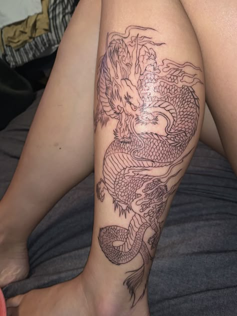 dragon tattoo on calf Dragon Calf Tattoos For Women, Calf Dragon Tattoo, Leg Tattoos Dragon, Dragon Tattoo On Calf, Dragon On Calf Tattoo, Dragon Tattoo Lower Leg, Lower Leg Dragon Tattoo, Dragon On Leg Tattoo, Dragon Tattoo For Women Calf