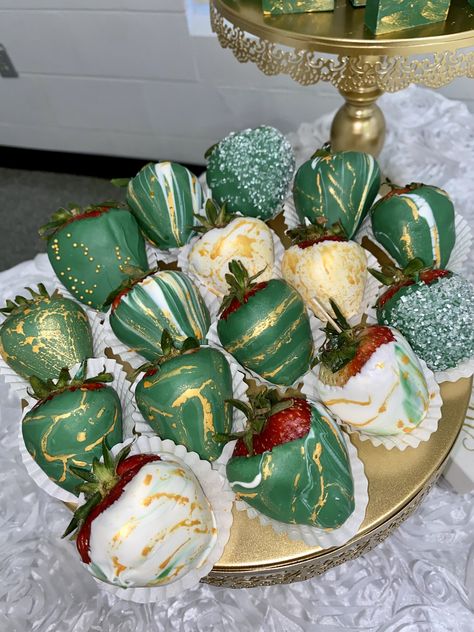 Emerald Green And Gold Treats Table, Green Black And Gold Dessert Table, Sweet 16 Party Emerald Green, Dessert Table Ideas Emerald Green, Emerald And Gold Treats, Green And Gold Strawberries Chocolate, Dessert Table Enchanted Forest, Green Gold Dessert Table, Green And Gold Treat Table