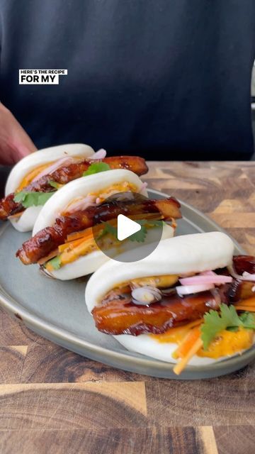 Dan Roberts on Instagram: "Pork Belly Bao Buns 🤤  Ingredients: serves 4-6  1kg pork belly strips skin removed 8 x Bao Buns homemade or store bought Coriander 1 carrot julienned  Braising liquid ingredients:  2/3 cup light soy sauce 2 Tbsp dark soy sauce 2/3 cup Shaoxing wine 1/2 cup brown sugar 2 cinnamon sticks 4 star anise 2 inch piece of ginger sliced 2 spring onions cut into batons 3 garlic cloves 2 cups water  Pickled Shallots:  2 shallots 1/4 cup rice vinegar 1/4 cup water 2 tablespoon sugar 1 teaspoon salt 1 tsp black peppercorns 1 tsp coriander seeds  Chilli Mayo:  ¼ cup Chilli Oil. ½ cup Japanese kewpie mayonnaise  Enjoy 😀  #porkbellybaobuns #baobuns #porkbelly #recipes #foodcreator #asmr" Pork Belly Bao Buns, Bao Buns Recipe, Pork Belly Bao, Pork Belly Strips, Pickled Shallots, Kewpie Mayonnaise, Ginger Slice, Bao Buns, Bun Recipe