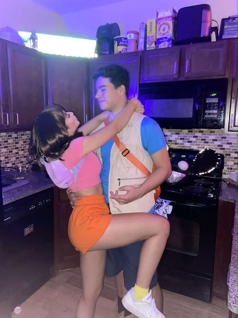 Rare Couple Halloween Costumes, Dora And Boots Couple Costume, Couples Halloween Costume For Brunettes, Classic Couple Halloween Costumes, Couple Themed Halloween Costumes, Unique Couple Halloween Costumes Brunette, Long Distance Halloween Costumes, Brown Couple Costumes, Couples Halloween Costumes Brunette