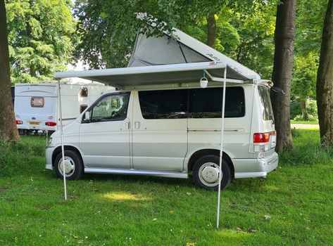 We bought a 20-odd year old mini camper - a Mazda Bongo Friendee - check out our first few weeks with it!