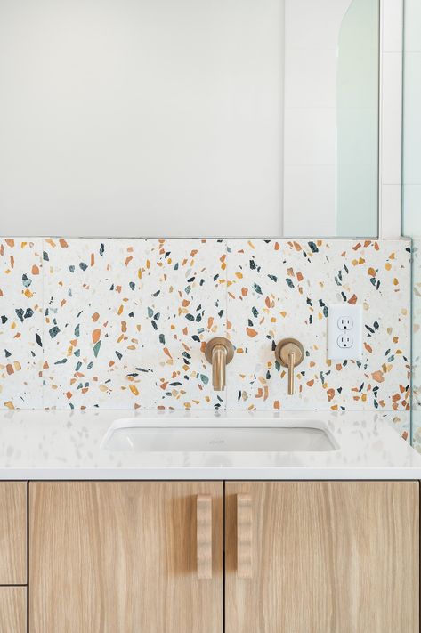 closeup of white quartz vanity counter and terrazzo tile backsplash Terrazzo Kitchen Counter, Terrazzo Kitchen Backsplash, Terrazzo Bathroom Tiles, Terrazzo Vanity, Terrazzo Backsplash, Bathroom Terrazzo, Office Kitchenette, Terrazzo Kitchen, Modern Retro Kitchen