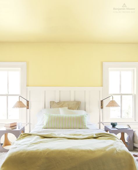 Bring new life to a small or dim #room with Beacon Hill Damask HC-2, an effervescent yellow with a hint of lime from the Benjamin Moore Color Trends 2021 palette. #ColorTrends2021 . (UPPER WALL & CEILING) Beacon Hill Damask HC-2, Regal® Select, Eggshell (TRIM & WAINSCOTING) Atrium White OC-145, Regal® Select, Semi-Gloss Yellow Bedroom Paint, Benjamin Moore Yellow, Painted Wainscoting, Yellow Paint Colors, White Wainscoting, Dark Paint Colors, Bedroom Wall Paint, Paint Colors Benjamin Moore, Benjamin Moore Colors