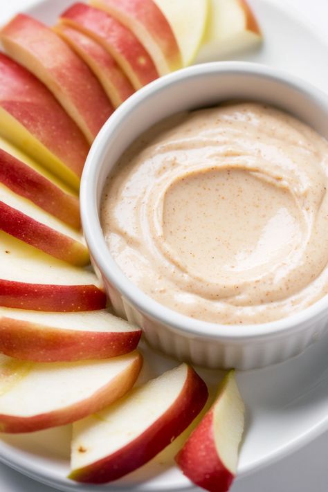 Discover a delicious and healthy snack with this easy recipe for Greek yogurt apple dip. This creamy and flavorful dip is perfect for any time of the day. Made with just a few ingredients, including Greek yogurt, honey, and cinnamon, it's a guilt-free treat that you'll love to indulge in. Whether you're looking for a quick breakfast option or a satisfying afternoon snack, this Greek yogurt apple dip is sure to hit the spot. Greek Yogurt Apple Dip, Yogurt Apple Dip, Yogurt Dip Recipes, Apple And Yogurt, Greek Yogurt Honey, Best Greek Yogurt, Yogurt Honey, Greek Yogurt Dips, Quick Treats