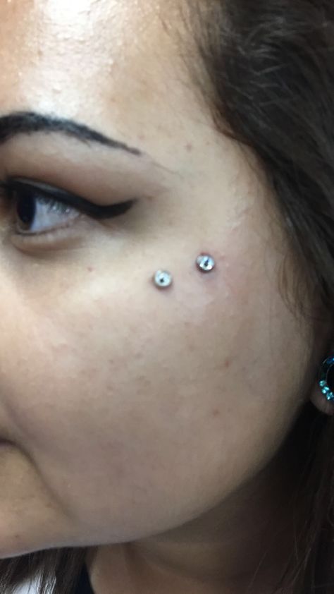 Double eye dermals Double Dermal Piercing, Double Dermal Piercing Face, Dermal Under Eye Piercing, Dermal Cheek Piercing, Cheek Dermal Piercing, Cheek Dermal Piercing Upper, Third Eye Dermal, Eye Dermal, Teardrop Dermal Piercing