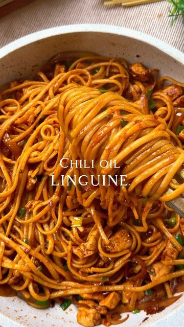 Secrets of Liya on Instagram: "“Chili Oil Chicken Linguine, the fusion of tender chicken, al dente linguine, and a spicy kick that’ll awaken your taste buds. 🔥🍝 “ Ingredients: * 8 oz linguine pasta * 2 boneless, skinless chicken breasts, cut into bite sized pieces * 1 tablespoon vegetable oil * 3 tablespoons chili oil (fried chili in oil) (adjust to your spice preference) * 1 tablespoon smoked paprika * Salt to taste * 1 tablespoon garlic, minced * 1 onion sliced * 2 tablespoons soy sauce * 3 tablespoon hoisin sauce * Some pasta water * 1 green onions, chopped Instructions: * Cook the linguine pasta according to package instructions until al dente. Drain and set aside. * In a large skillet or wok, heat vegetable oil, over medium-high heat. * Add minced garlic and chicken, with c Chili Oil Chicken, Chicken Linguine, Chipotle Pasta, Linguine Pasta, Pasta Water, Tasty Recipes Videos, Quick Recipes Snacks, Chili Oil, Tender Chicken