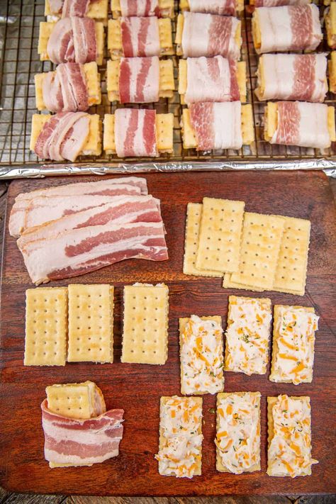 Crack Bacon Crackers Recipe – These things fly off the plate at parties! Super easy to make with only 5 ingredients! Club crackers, cream cheese, ranch dressing mix, cheddar cheese, and bacon. Can make 10 or 100. Can assemble ahead of time and bake when ready. A bacon lover's dream! This bacon cracker recipe makes a great appetizer, breakfast snack, tailgate dish, and party food. You are going to love them! Candied Bacon Crackers With Cream Cheese, Bacon Parmesan Crackers, Bacon Wrapped Club Crackers Parmesan, Bacon Crackers Appetizers, Bacon Wrapped Club Crackers, Savory Saltine Cracker Recipes, Bacon Crackers Brown Sugar, Ritz Snacks, Bacon Wrapped Crackers