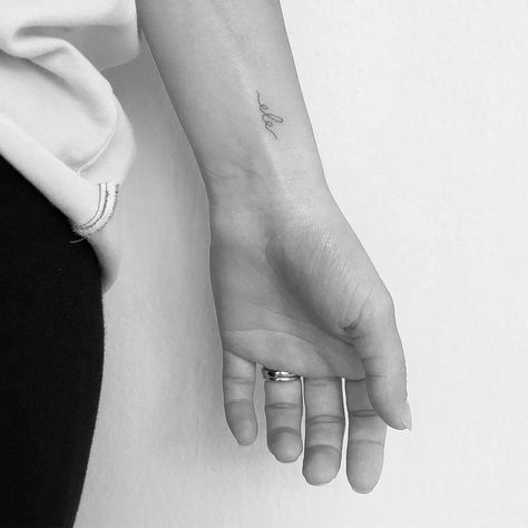 Tiny Tattoo For Daughter, Small Mom Tattoo Ideas, Tattoo Ideas For New Moms, Minimal Mom Tattoo, Dainty Tattoo For Kids, Fine Line Children Tattoo, Baby Initial Tattoos, Tiny Mother Daughter Tattoos Meaningful, Small Kids Name Tattoos For Women