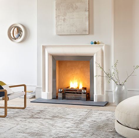 A robust example of a bolection, a moulding popularised by Christopher Wren following his tours of Italy and seen in his work throughout Hampton Court Palace. Black Fireplace Surround, Limestone Fireplace Surround, Slate Hearth, Black Fireplace, Mantel Design, Limestone Fireplace, Contemporary Fireplace, Home Fireplace, Modern Fireplace