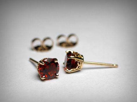 Garnets are January birthstones but would also make nice Valentine's gifts. Ruby Earrings Studs, Stud Earrings Unique, Blue Crystal Earrings, Geode Earrings, Hammered Hoop Earrings, Unusual Earrings, Rose Gold Studs, Birthstone Earrings, Garnet Jewelry