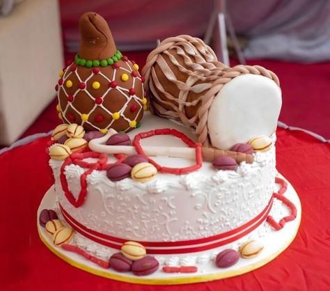 Nigerian Traditional Wedding Cakes! - Food - Nairaland Coral beads. Kola nuts. Calabash. Drum. Palm Wine. Igba Nkwu. Igbo.#nigerianweddings #nigerianbride. Follow @chiefwedslolo for more Nigerian wedding cakes. African Wedding Cakes, African Cake, African Inspired Wedding, Igbo Traditional Wedding, Nigerian Traditional Wedding, Traditional Wedding Cakes, Wedding Cake Pictures, Traditional Wedding Cake, African American Weddings