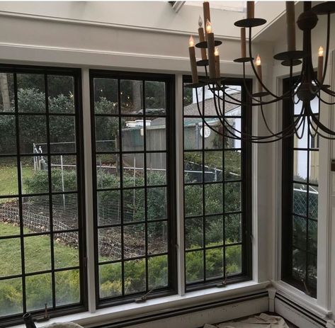 Pained Windows Black, Big Windows Black Frame, Black Pane Windows, Black Square Windows, Sunroom Black Windows, Interior With Black Windows, Black Windows With Grids, White And Black Windows, Black French Windows