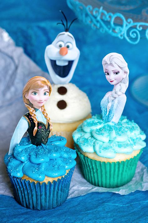 Frozen Cupcakes for a sweet granddaughter's  birthday celebration Frozen Cupcake, Frozen Birthday Cupcakes, Cupcakes Frozen, Disney Frozen Cupcakes, Torte Frozen, Cupcakes Princesas, Elsa Torte, Frozen Cupcake Toppers, Frost Cupcakes