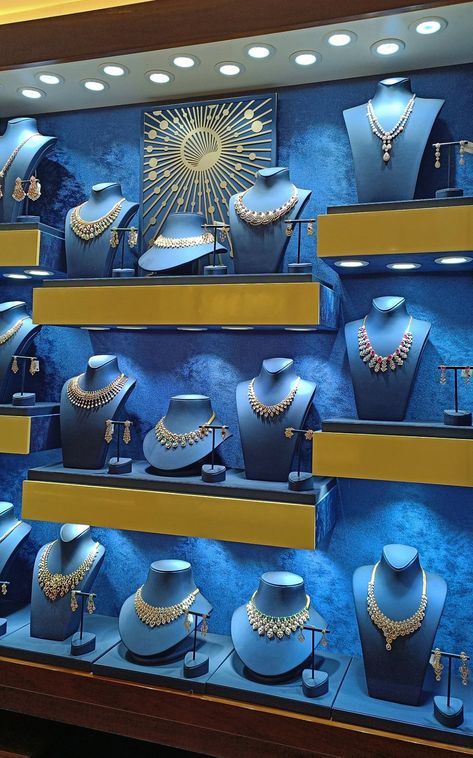 Jwellery Shops Interior, Jewelry Showroom Interiors, Jewellery Shop Interior Design, Bedroom Back Wall Design, Bedroom Back Wall, Back Wall Design, Jewelry Wall Display, Jewelry Display Booth, Mobile Shop Design