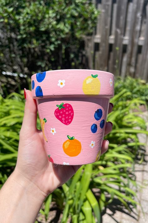 I’ve been obsessed with all the cute painted terracotta pots I’ve seen on Etsy and Pinterest lately, so I decided to give it a try and make my own.  It’s a fun, creative way to personalize my space without breaking the bank. Plus, it’s a great DIY project to tackle over the weekend! In this post, I’ll walk you through how to paint terracotta pots and turn them into colorful, customized masterpieces. Painting Ideas On A Pot, Terracotta Pots Design, Cute Plant Pot Painting Ideas, Painting Pot Plants, Painting Ideas For Plant Pots, Cute Flower Pot Designs, Diy Painting Flower Pots, Succulent Pot Painting Ideas, Cute Pot Designs Painted