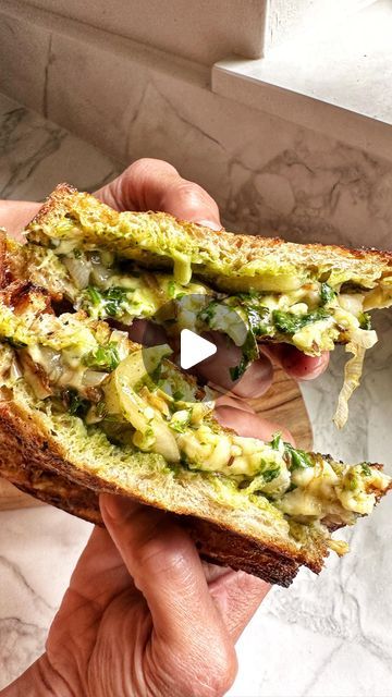 Chetna Makan on Instagram: "BETWEEN THE SLICES - Episode 34 
Onion and Cheese Sandwich 
2 tbsp oil 
1 tsp cumin seeds 
5-6 curry leaves 
2 green chillies, sliced 
3 shallots, thinly sliced 
1/4 tsp salt 
1/2 tsp chaat masala 
100 gms cheddar, grated 
Slices of sourdough 
Handful of fresh coriander 
1 green chilli 
Pinch of salt 
Pinch of sugar 
Juice of 1/2 lemon 
Enjoy x
#reels #chetnamakan #food #vegetarian #sandwich #betweentheslices #lunch #recipes #reelsvideo" Sandwich Recipes Vegetarian Indian, Snacky Lunches, Chetna Makan, Melted Cheese Sandwich, Vegetarian Sandwich Recipes, Food Vegetarian, Vegetarian Indian, Vegetarian Sandwich, Cumin Seeds