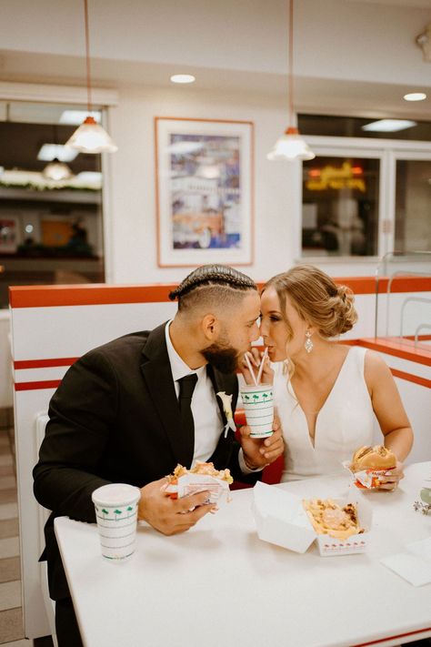 The newlyweds traded the stunning red sandstones that set the scene of their elopement for a night out on the town, surrounded by the brightest neon lights. The couple also double-doubled the romance with a pit stop to the famous burger joint. After a day full of “Yes’s” and “I do’s”, a romantic dinner of burgers, fries, and milkshakes for two was the perfect way to end the night. In And Out Wedding Photos, Fast Food Wedding Photos, Fast Food Wedding, Wedding Fast Food, Burgers Wedding, In N Out Wedding, Creative Photoshoots, Vegas Wedding Photos, Alt Wedding