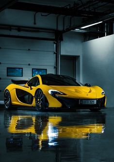 Mc Laren P1. Should Mc Laren P1. Should I add it to my garage of toys? Or is it pretentious? #garage #laren #pretentious #should #luxurycars #coolcars Yellow Sports Car, Mclaren P1, Sports Car, Garage, Doors, Cars, Sports, Yellow