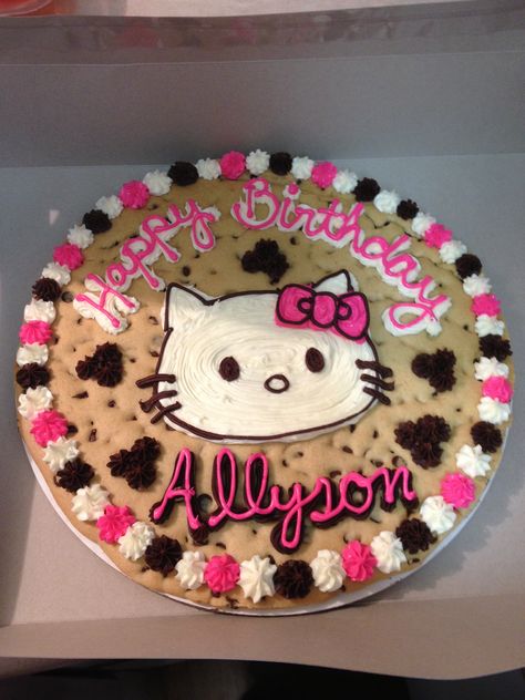 Hello Kitty on a sugar free 14" cookie cake Hello Kitty Cake Easy, Hello Kitty Chocolate Cake, Hello Kitty Cookie Cake, Hello Kitty Birthday Cookies, Hello Kitty Birthday Theme, Kitty Birthday Cake, Hello Kitty Cookies, Hello Kitty Birthday Cake, 7th Birthday Cakes